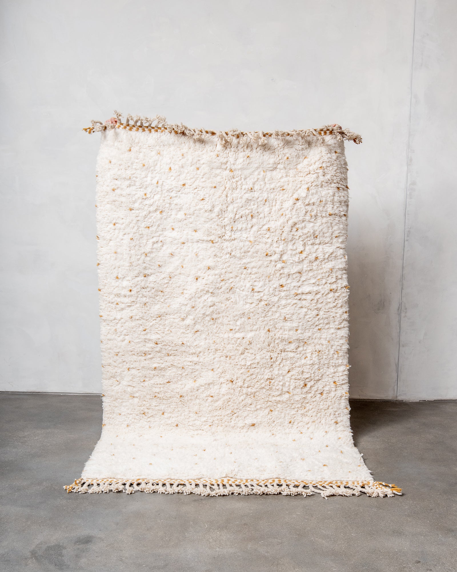 Modern, designer, handcrafted Berber rug from Morocco. Beniourain carpet with beautiful colours and patterns and fluffy wool texture.